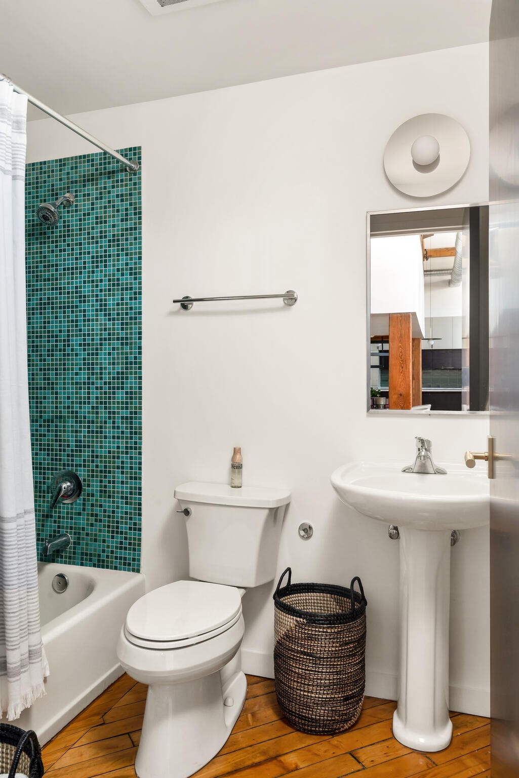 1400 Rosa L Parks Boulevard, Unit 216 Nashville, TN 37208 - Photo 19 of 29 a bathroom with a toilet a sink and bathtub