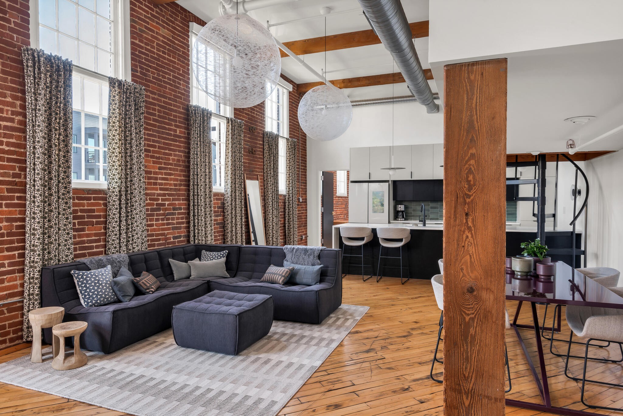 1400 Rosa L Parks Boulevard, Unit 216 Nashville, TN 37208 - Photo 3 of 29 a living room with furniture and a large window