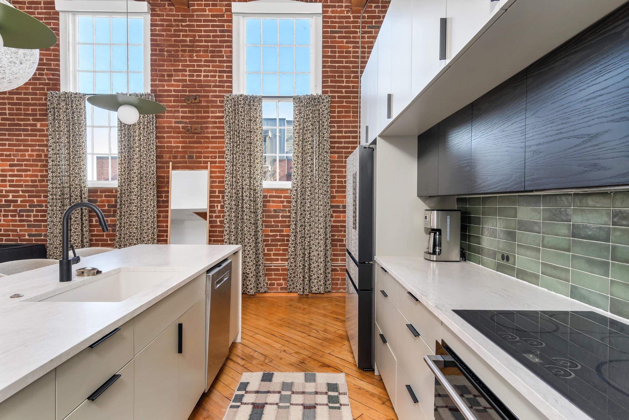 1400 Rosa L Parks Boulevard, Unit 216 Nashville, TN 37208 - Photo 5 of 29 a bathroom with a sink and a mirror