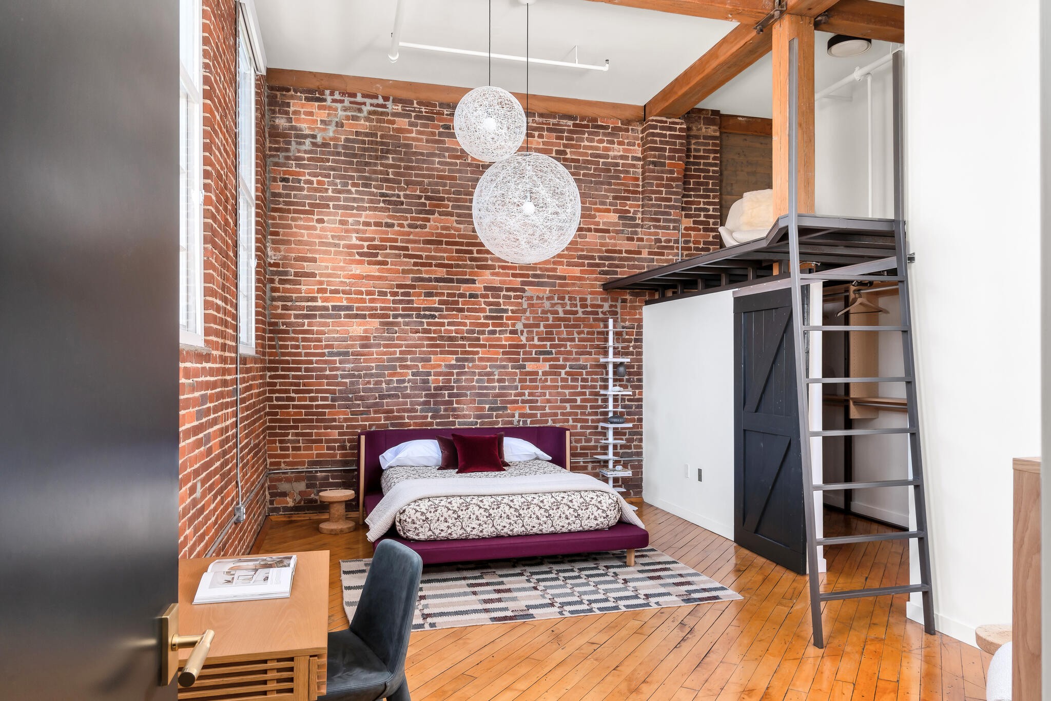 1400 Rosa L Parks Boulevard, Unit 216 Nashville, TN 37208 - Photo 7 of 29 a bathroom with a granite countertop sink and a mirror
