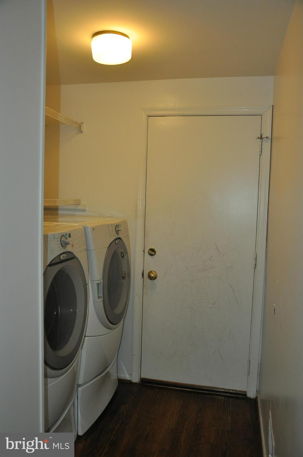 12 Starlight Court Potomac, MD 20854 - Photo 8 of 19 a utility room with dryer and washer