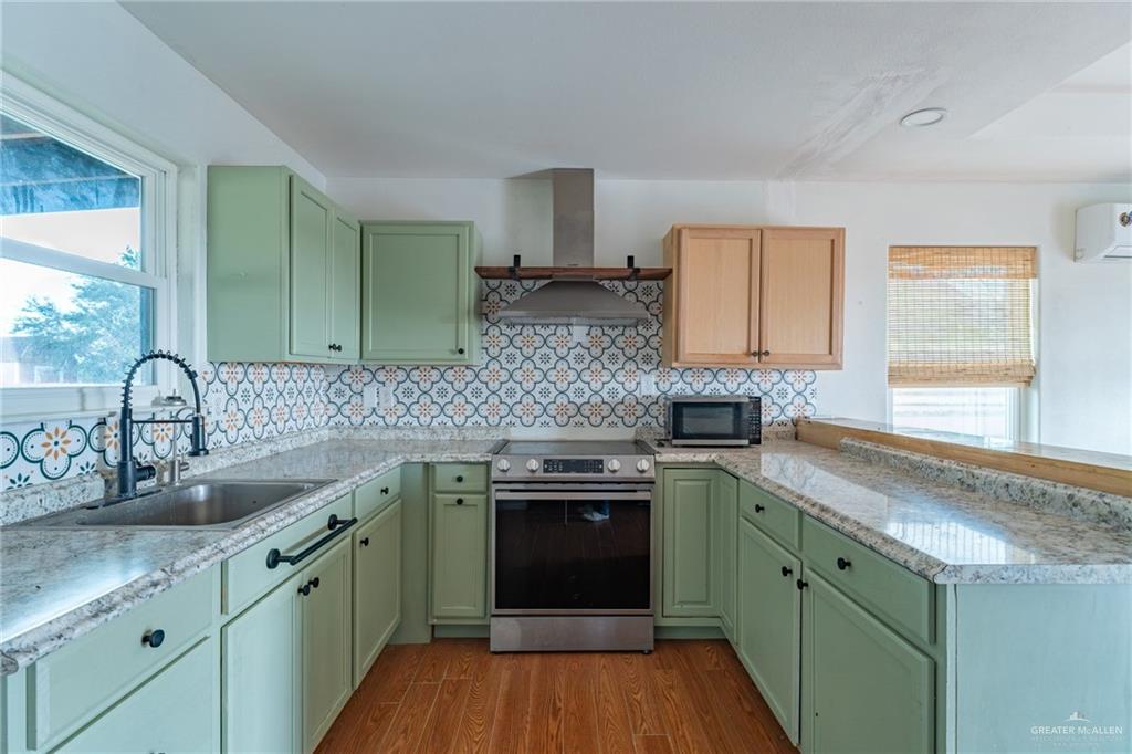 15002 Davis Road Edcouch, TX 78538 - Photo 11 of 33 a kitchen with a sink and cabinets