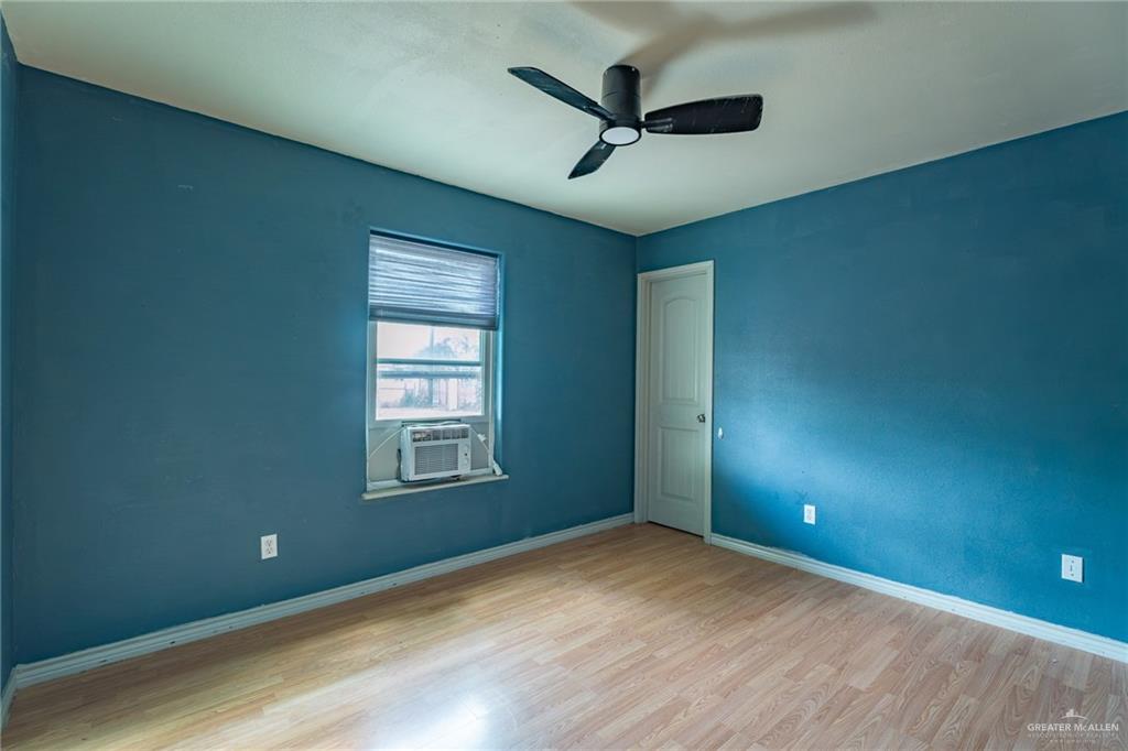 15002 Davis Road Edcouch, TX 78538 - Photo 15 of 33 an empty room with windows and fan