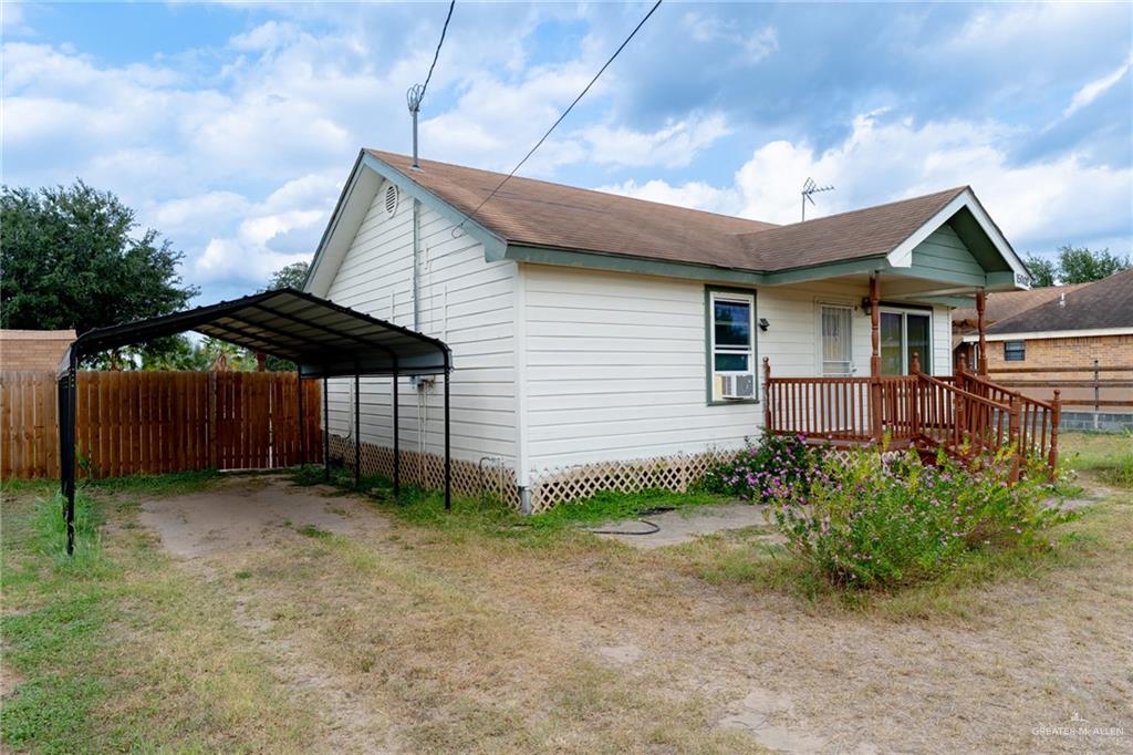 15002 Davis Road Edcouch, TX 78538 - Photo 2 of 33 a backyard of a house with barbeque oven fire pit table and chairs