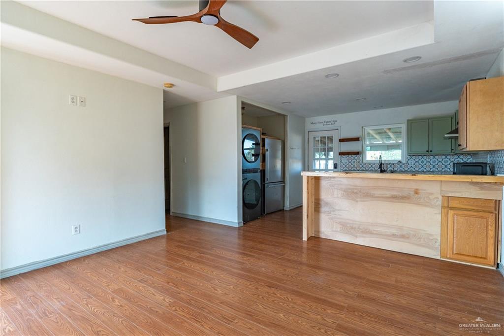 15002 Davis Road Edcouch, TX 78538 - Photo 6 of 33 a kitchen with a refrigerator and a sink