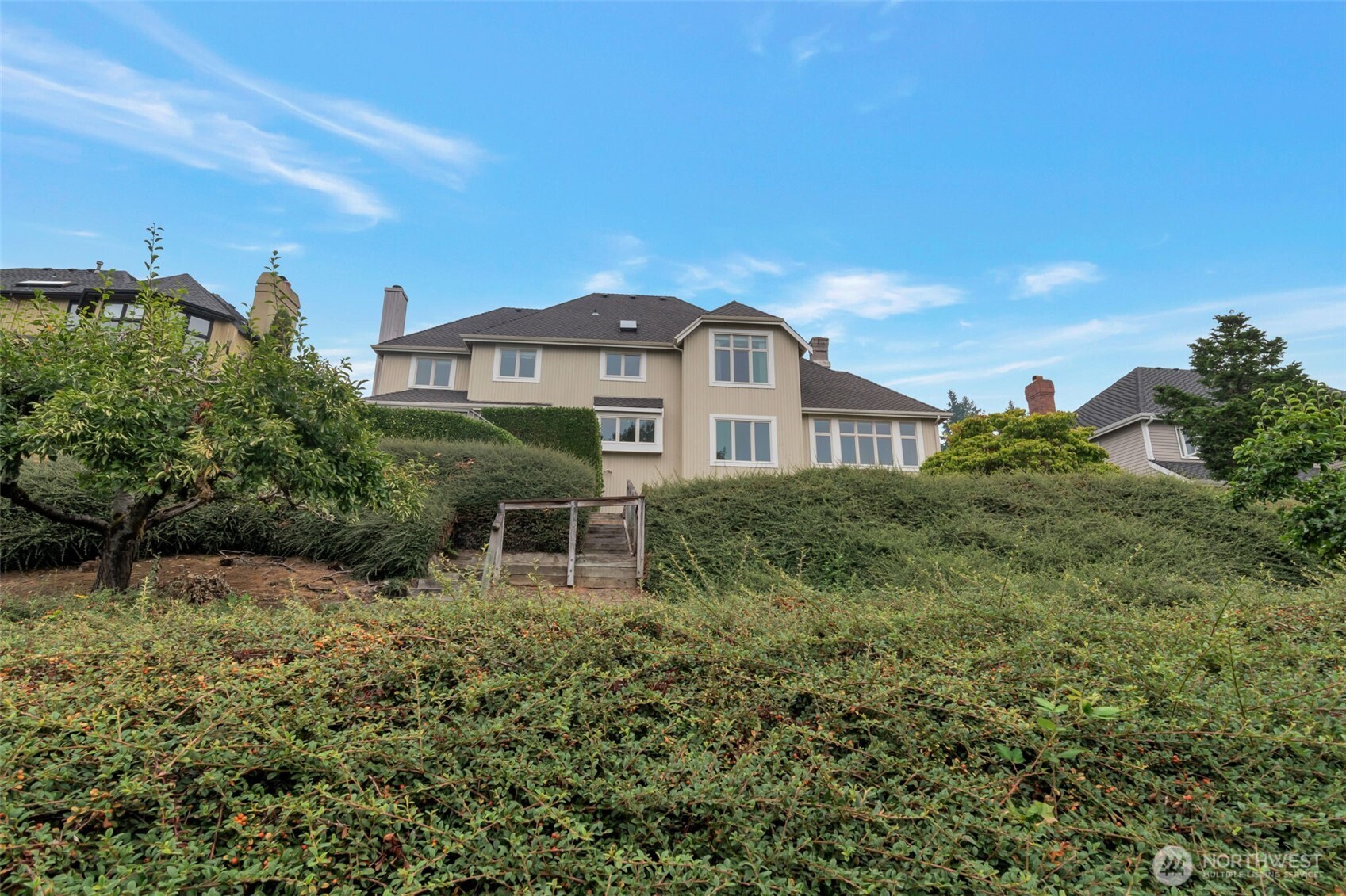 4131 205th Avenue Southeast Sammamish, WA 98075 - Photo 20 of 20 a view of a house with a yard