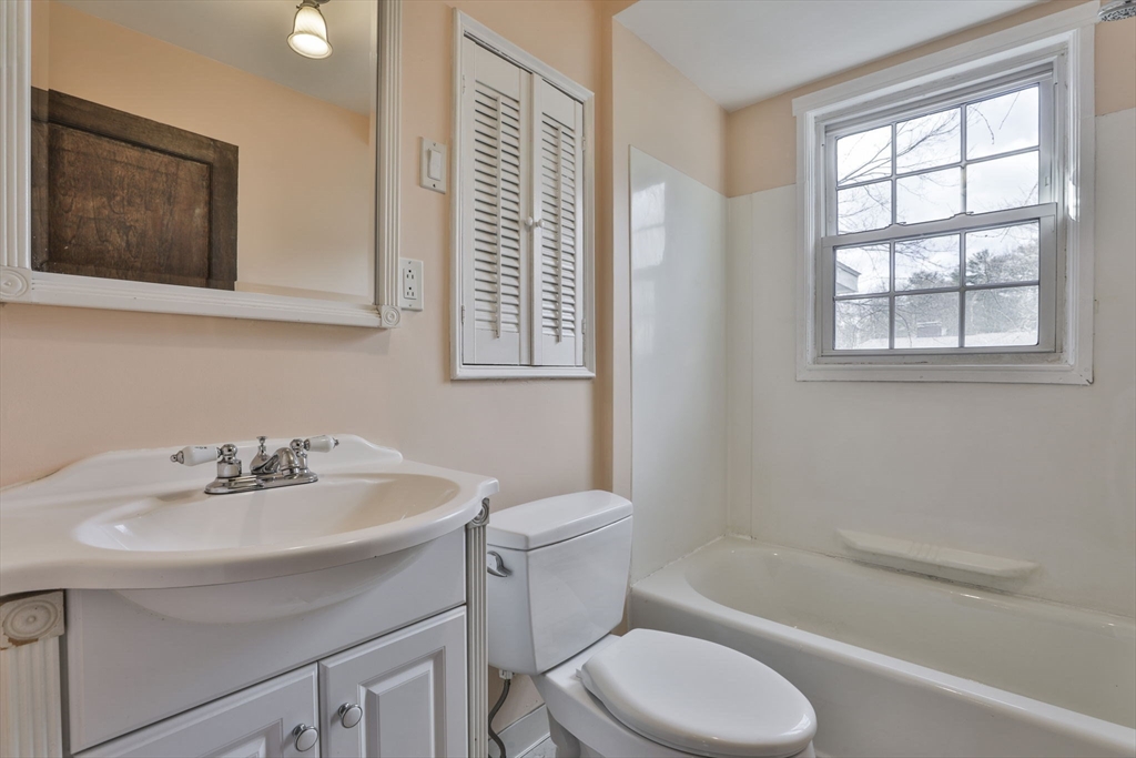 3 Veterans Lane Stoneham, MA 02180 - Photo 20 of 41 a bathroom with a sink toilet and shower