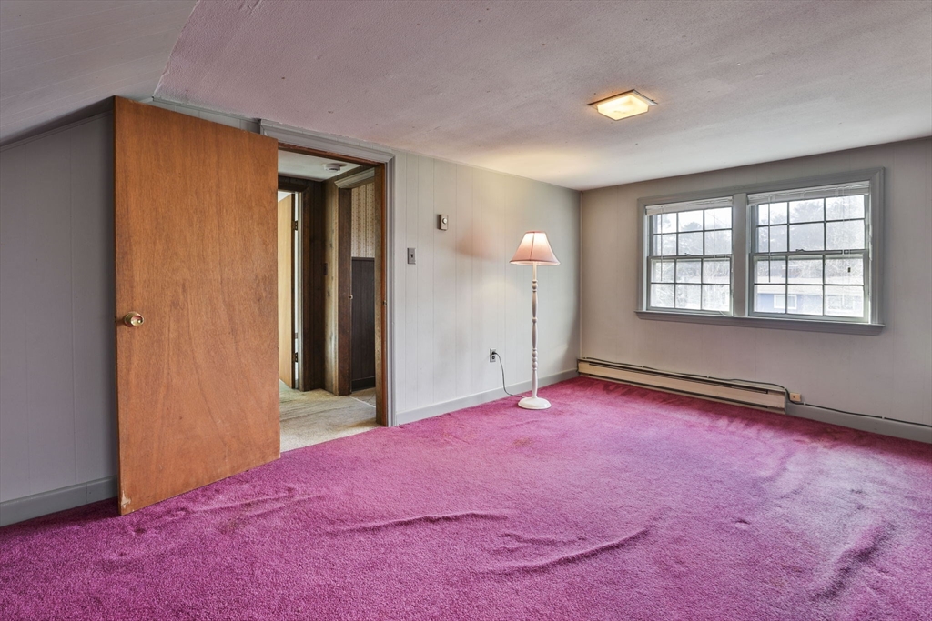 3 Veterans Lane Stoneham, MA 02180 - Photo 21 of 41 an empty room with windows and closet