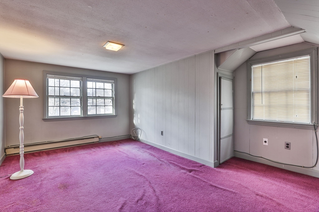 3 Veterans Lane Stoneham, MA 02180 - Photo 23 of 41 an empty room with windows