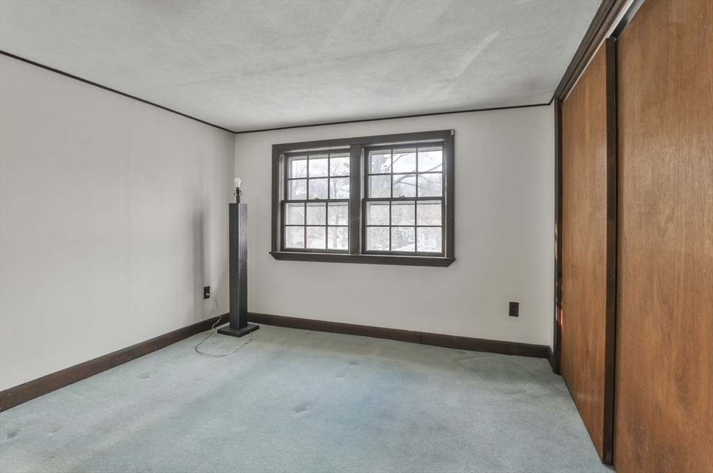 3 Veterans Lane Stoneham, MA 02180 - Photo 26 of 41 an empty room with windows