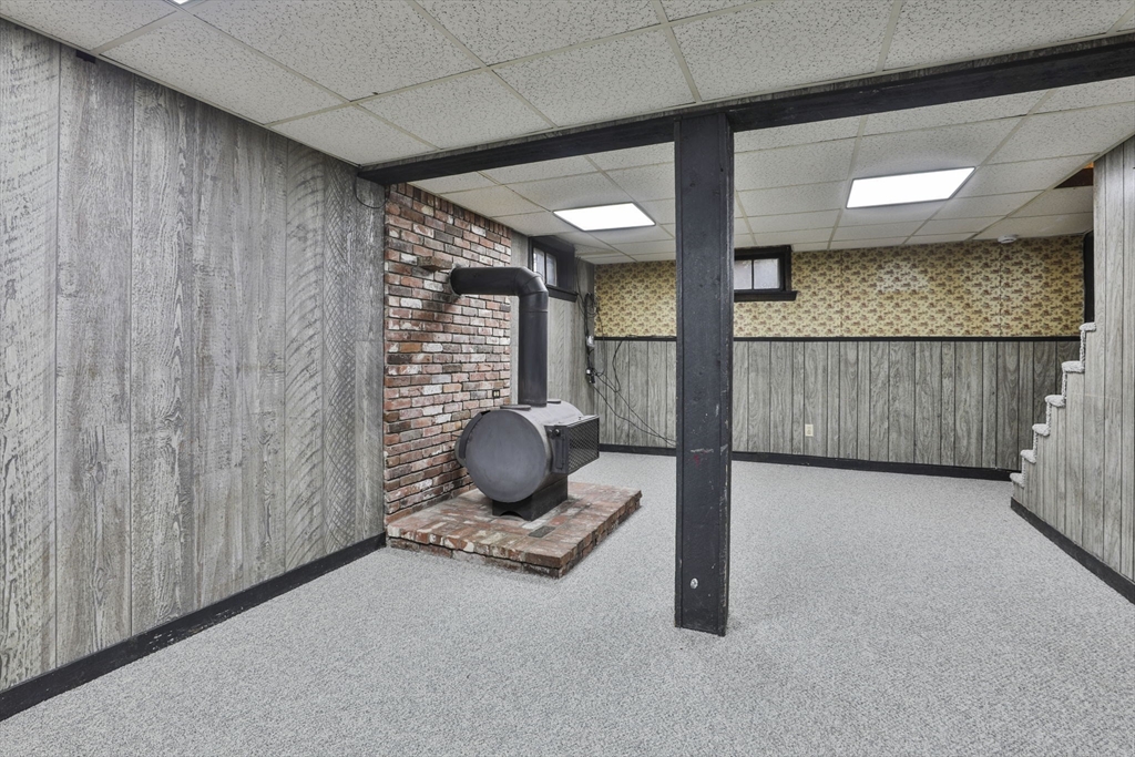 3 Veterans Lane Stoneham, MA 02180 - Photo 30 of 41 a view of an empty room with a window