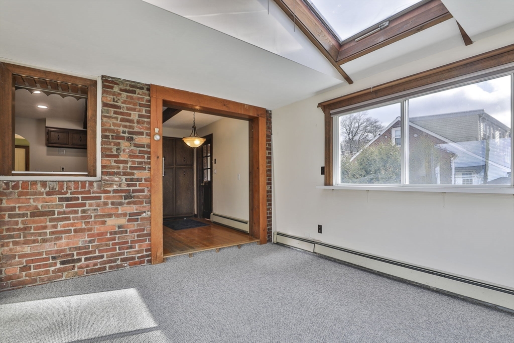 3 Veterans Lane Stoneham, MA 02180 - Photo 9 of 41 a view of an empty room with a window