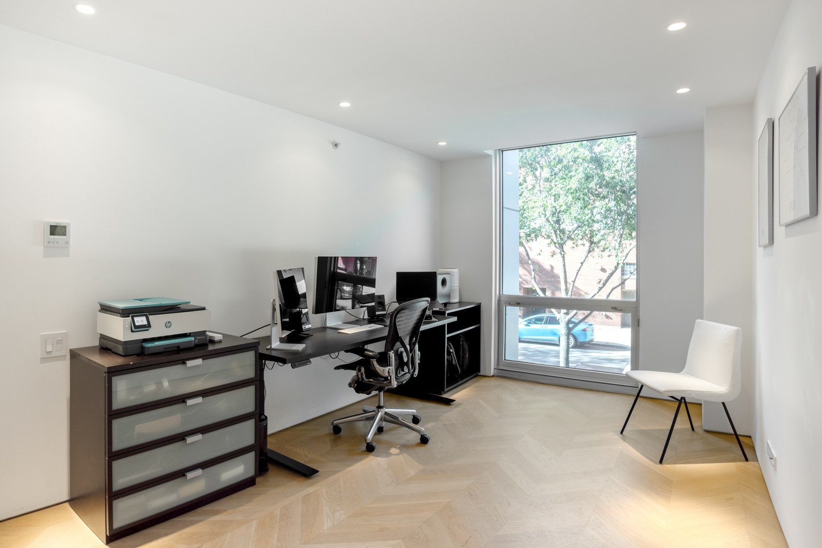 1917 South Calumet Avenue Chicago, IL 60616 - Photo 22 of 41 a view of a workspace with furniture and a window