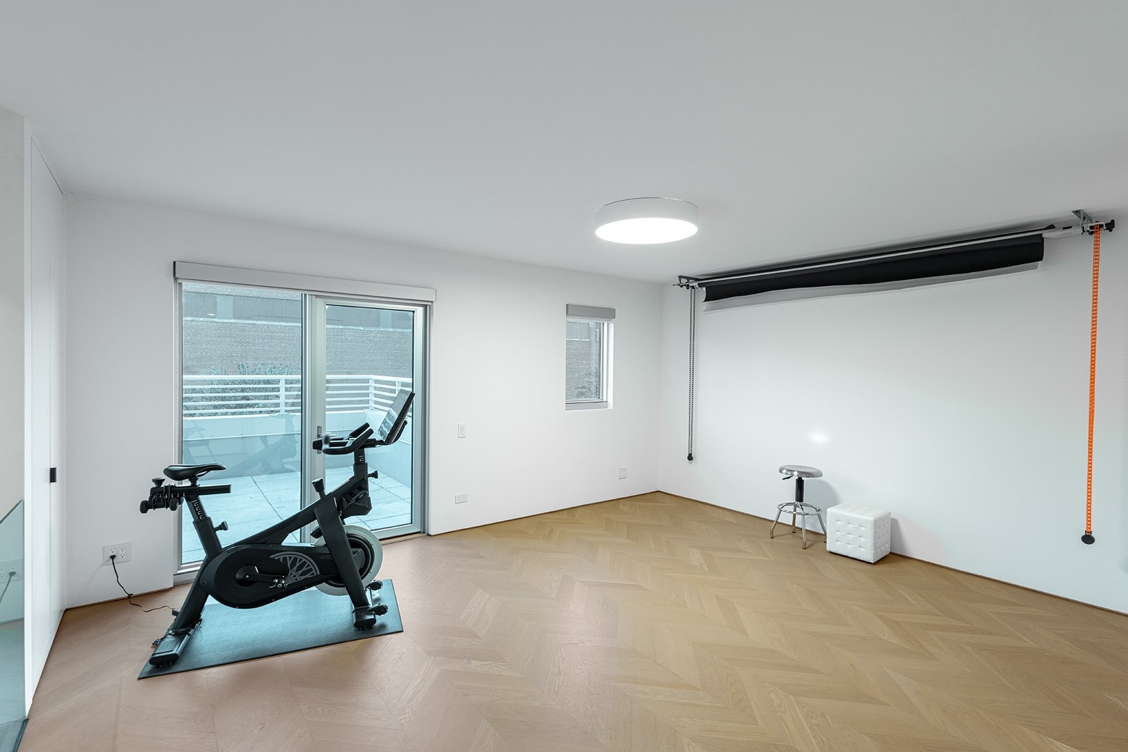 1917 South Calumet Avenue Chicago, IL 60616 - Photo 26 of 41 a view of a room with gym equipment and a window