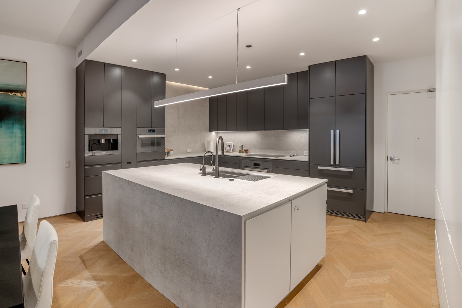 1917 South Calumet Avenue Chicago, IL 60616 - Photo 10 of 41 a kitchen with kitchen island a sink stainless steel appliances and cabinets