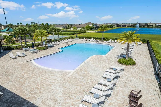 a view of a lake with a yard