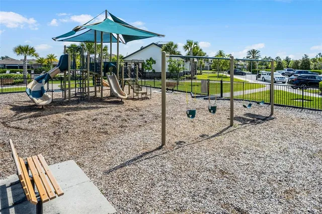 a view of a park with a slide