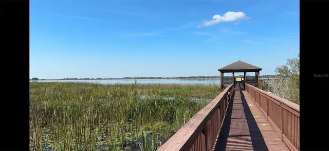 a view of a lake and a balcony