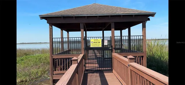 a view of a balcony with furniture