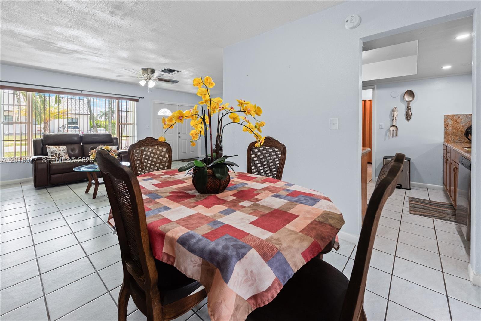 731 Northwest 17th Street Homestead, FL 33030 - Photo 4 of 29 a bedroom with a bed and wooden floor