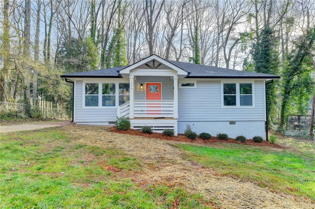 1434 Midview Drive Decatur, GA 30032 - Photo 1 of 1 a front view of a house with yard