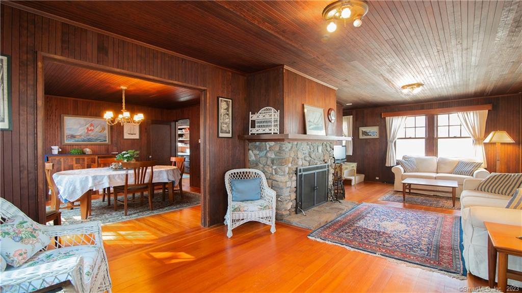 106 East Shore Avenue Groton, CT 06340 - Photo 12 of 39 a view of a livingroom with furniture and a fireplace