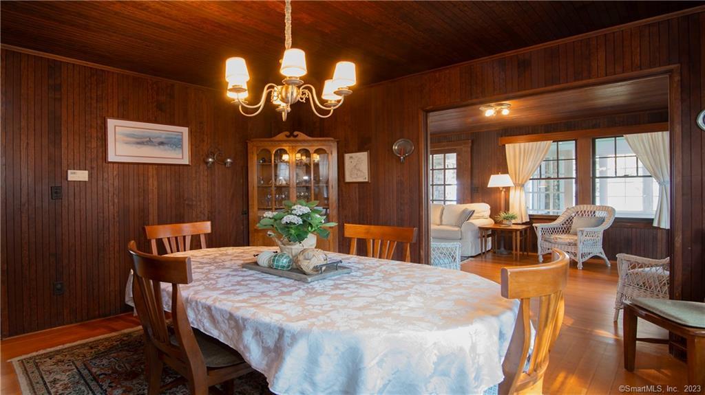106 East Shore Avenue Groton, CT 06340 - Photo 14 of 39 a view of a dining room with furniture window and outside view