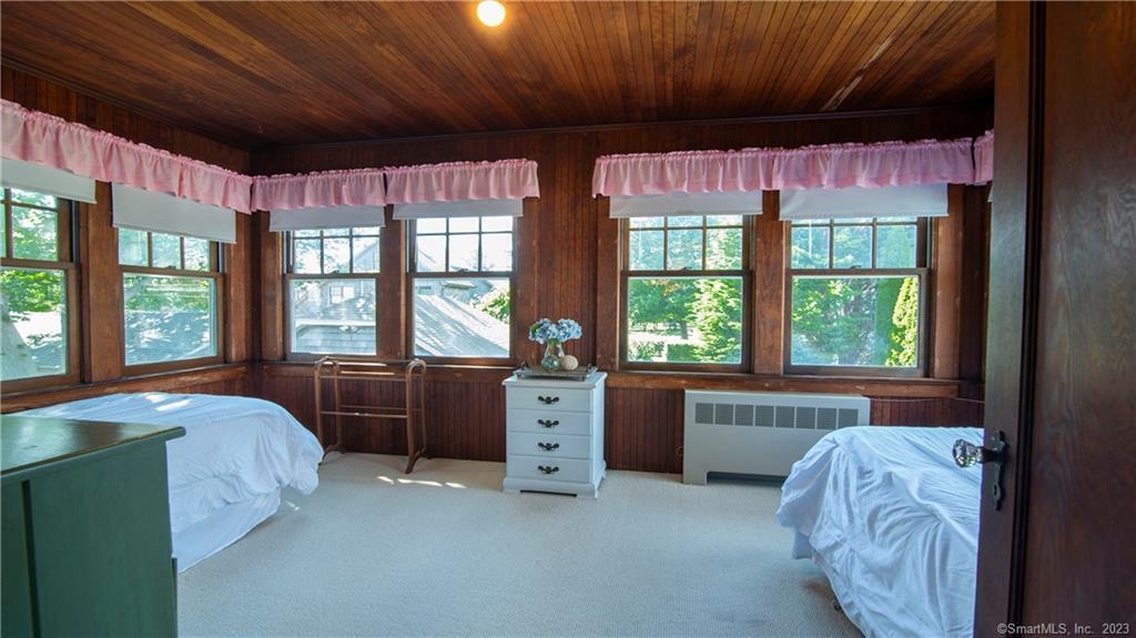106 East Shore Avenue Groton, CT 06340 - Photo 24 of 39 a bed room with a bed and a large window