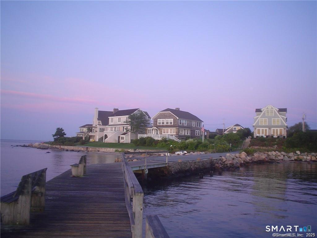 106 East Shore Avenue Groton, CT 06340 - Photo 28 of 39 a view of a lake in front of residential houses