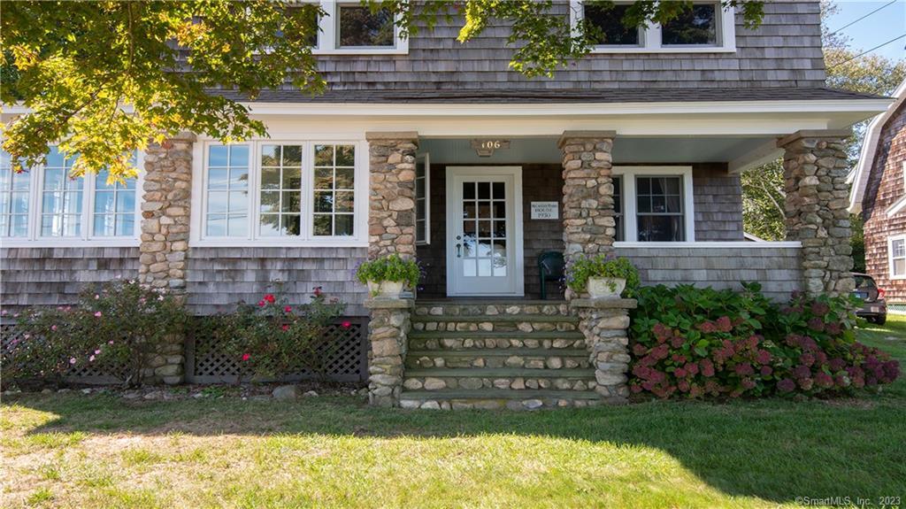 106 East Shore Avenue Groton, CT 06340 - Photo 6 of 39 a front view of a house with a yard