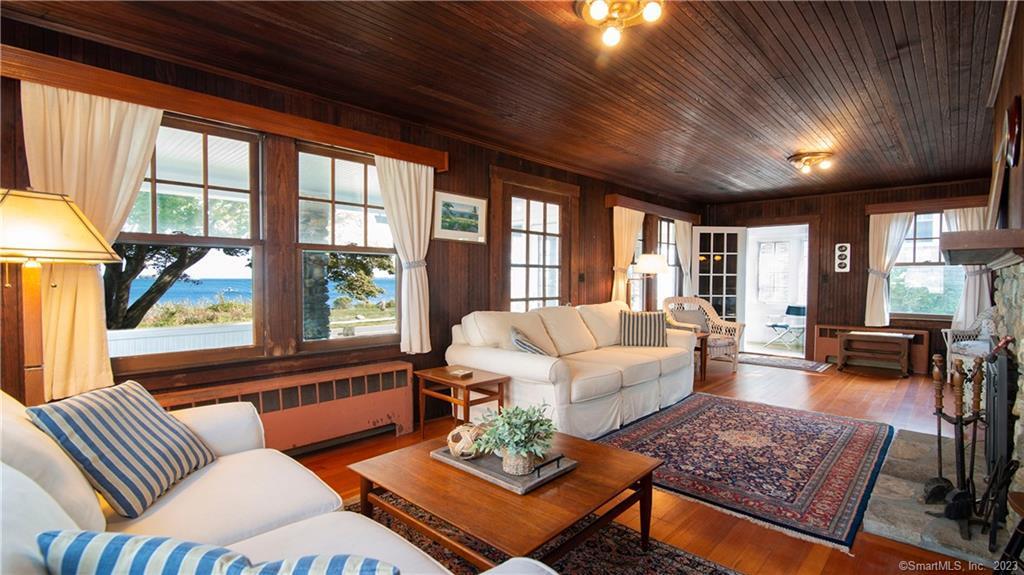 106 East Shore Avenue Groton, CT 06340 - Photo 10 of 39 a living room with furniture and a large window