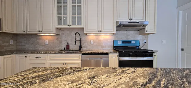 a view of balcony with wooden floor and outdoor seating