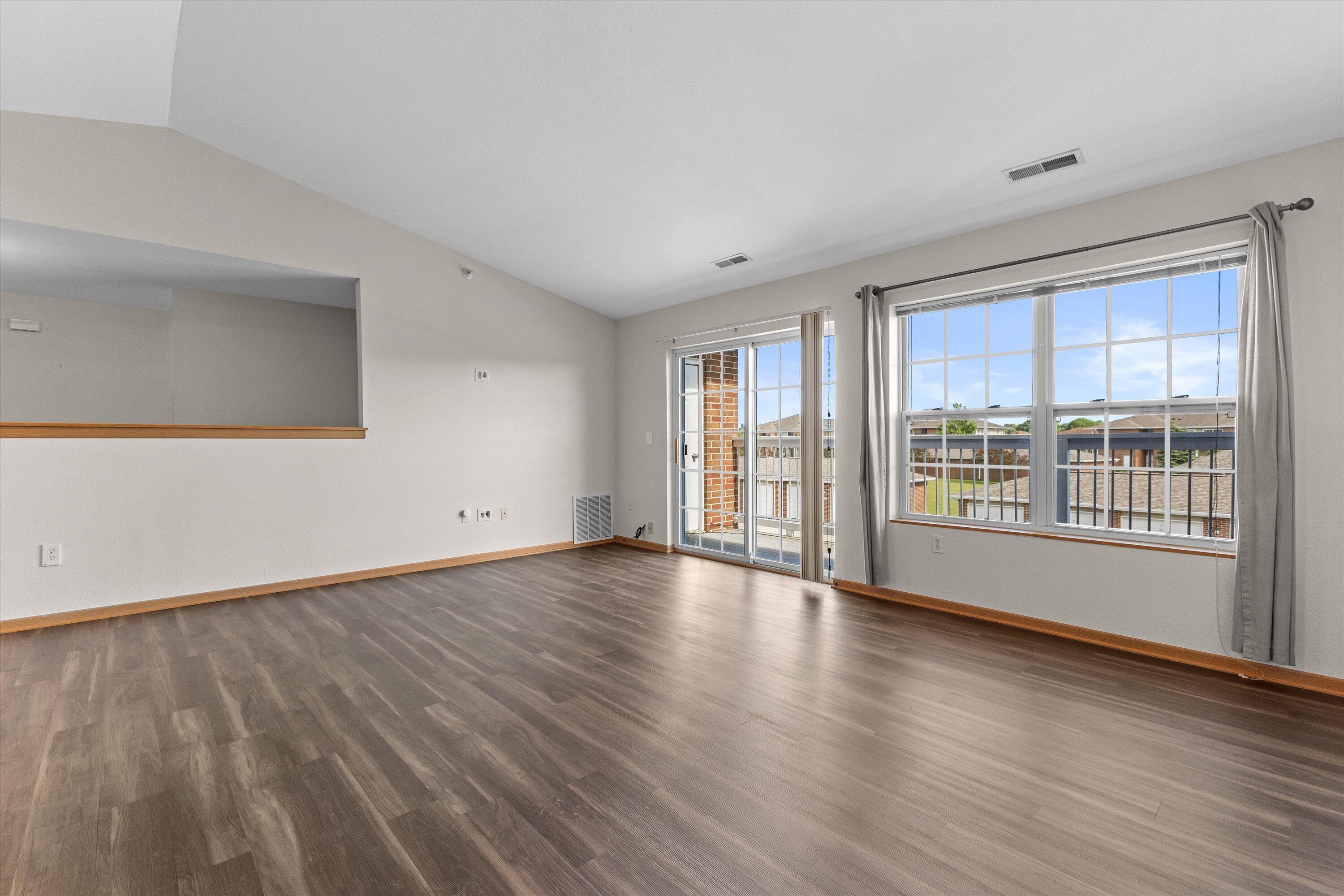6746 100th Place, Unit E Pleasant Prairie, WI 53158 - Photo 2 of 21 Living/Dining Area