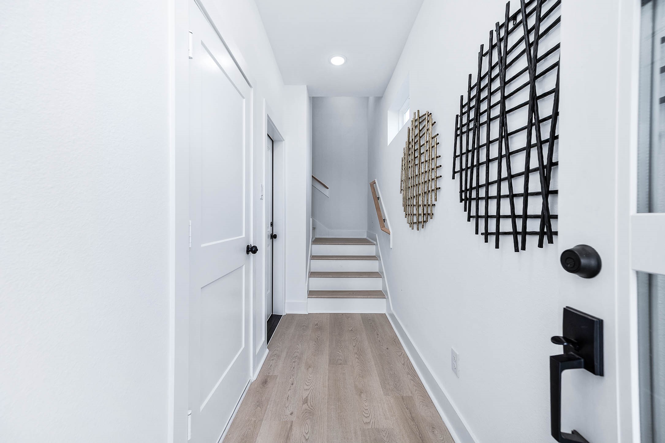 1515 Euel Street Houston, TX 77009 - Photo 7 of 34 Bright and welcoming entry hallway with modern finishes, clean lines, and stylish accents leading you into the heart of the home.