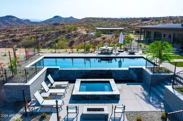 an aerial view of residential houses and outdoor space