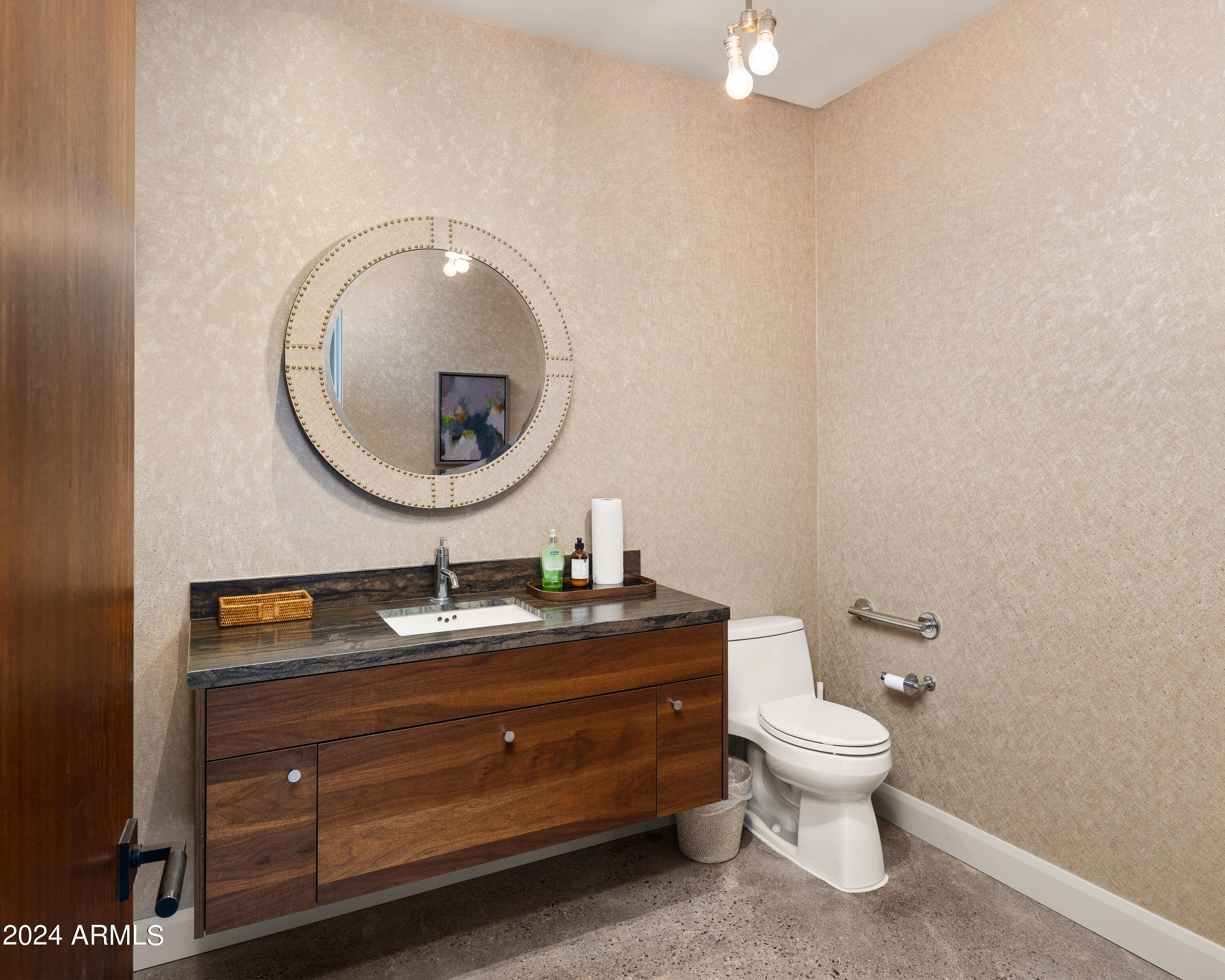 15310 North Sandy Bluff Road Fort McDowell, AZ 85264 - Photo 12 of 58 a bathroom with a toilet sink and mirror