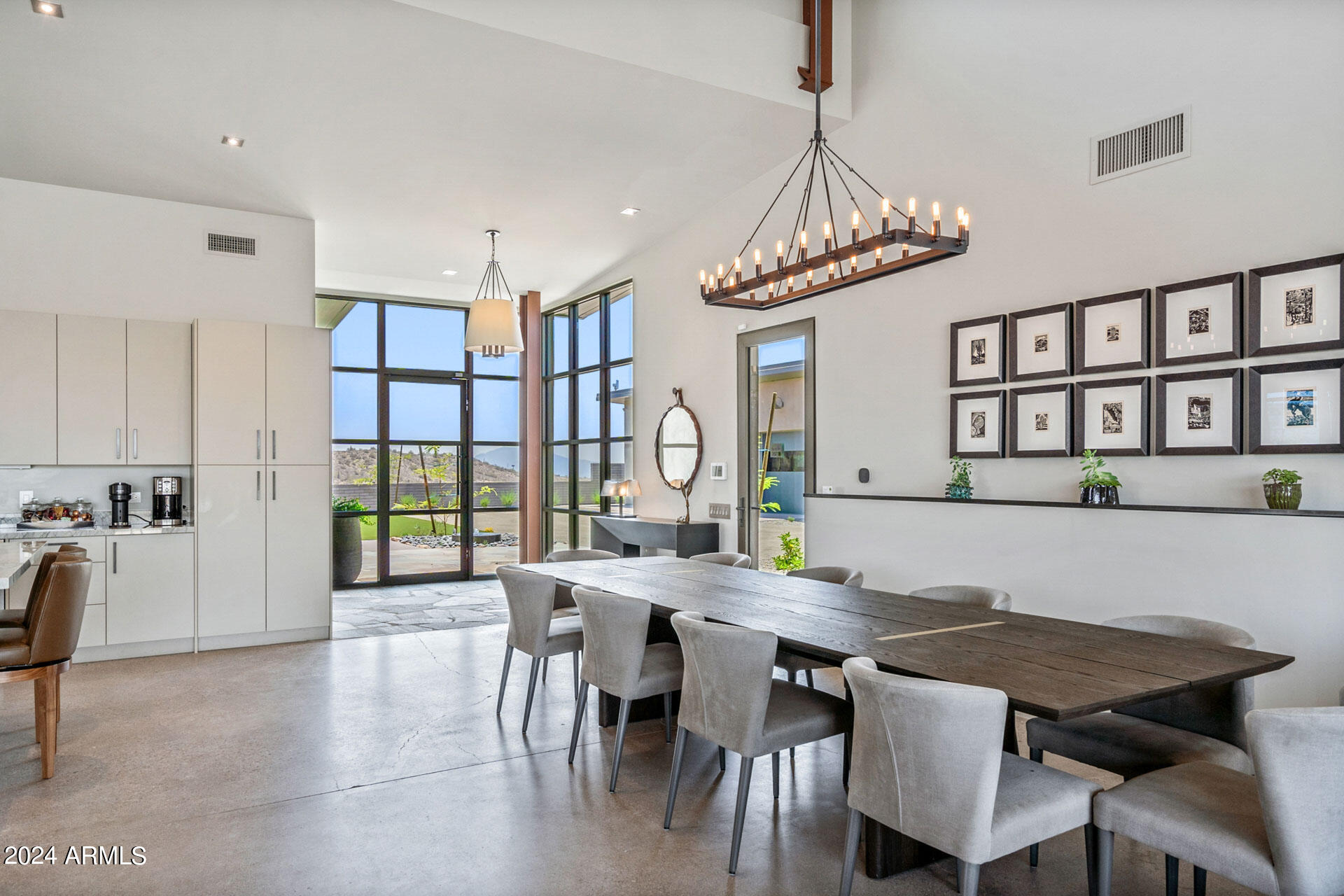 15310 North Sandy Bluff Road Fort McDowell, AZ 85264 - Photo 13 of 58 a view of a dining room with furniture and a chandelier