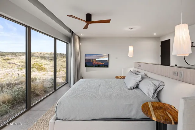 a bathroom with a sink vanity and mirror