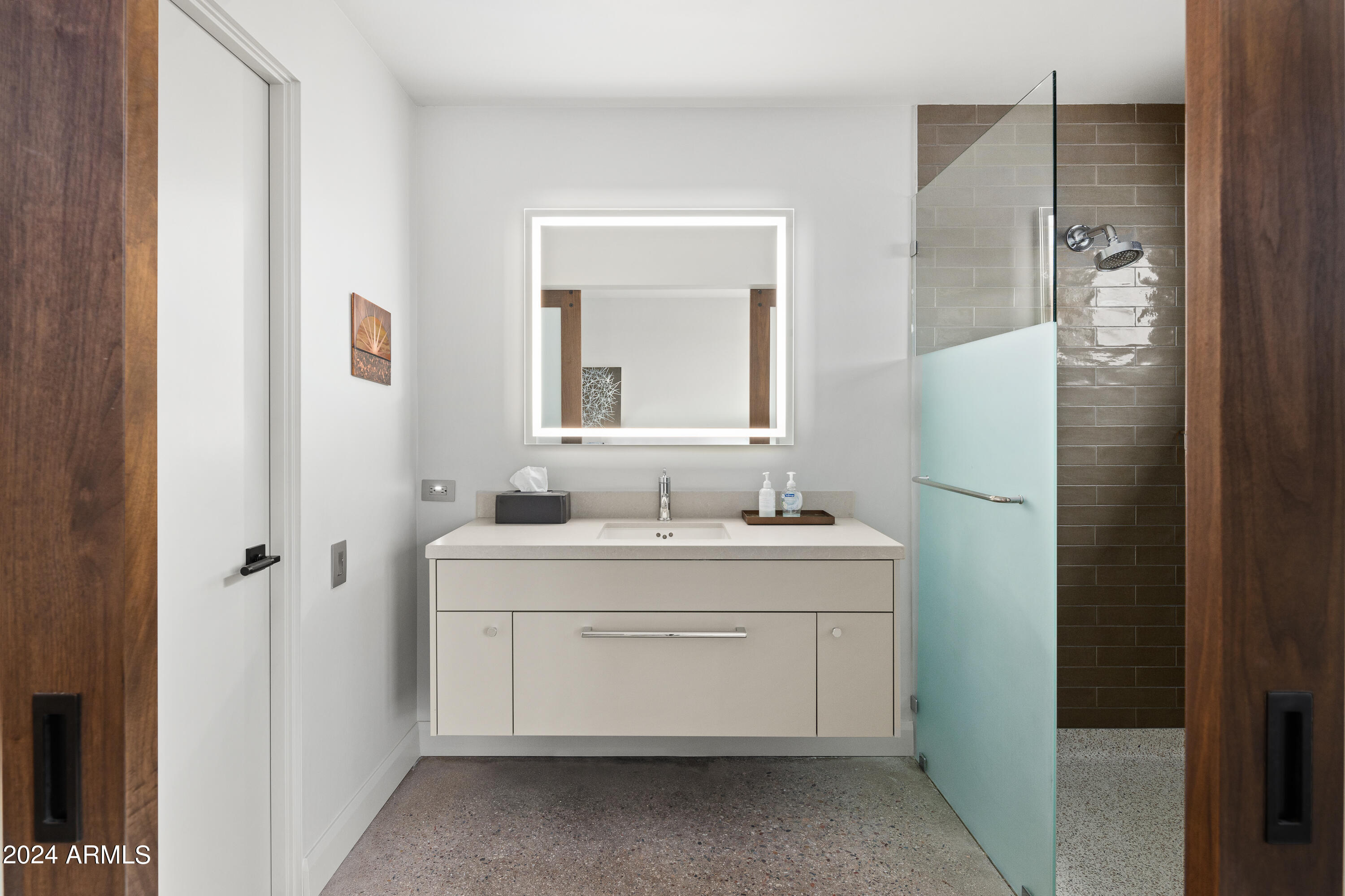 15310 North Sandy Bluff Road Fort McDowell, AZ 85264 - Photo 23 of 58 a bathroom with a double vanity sink and mirror
