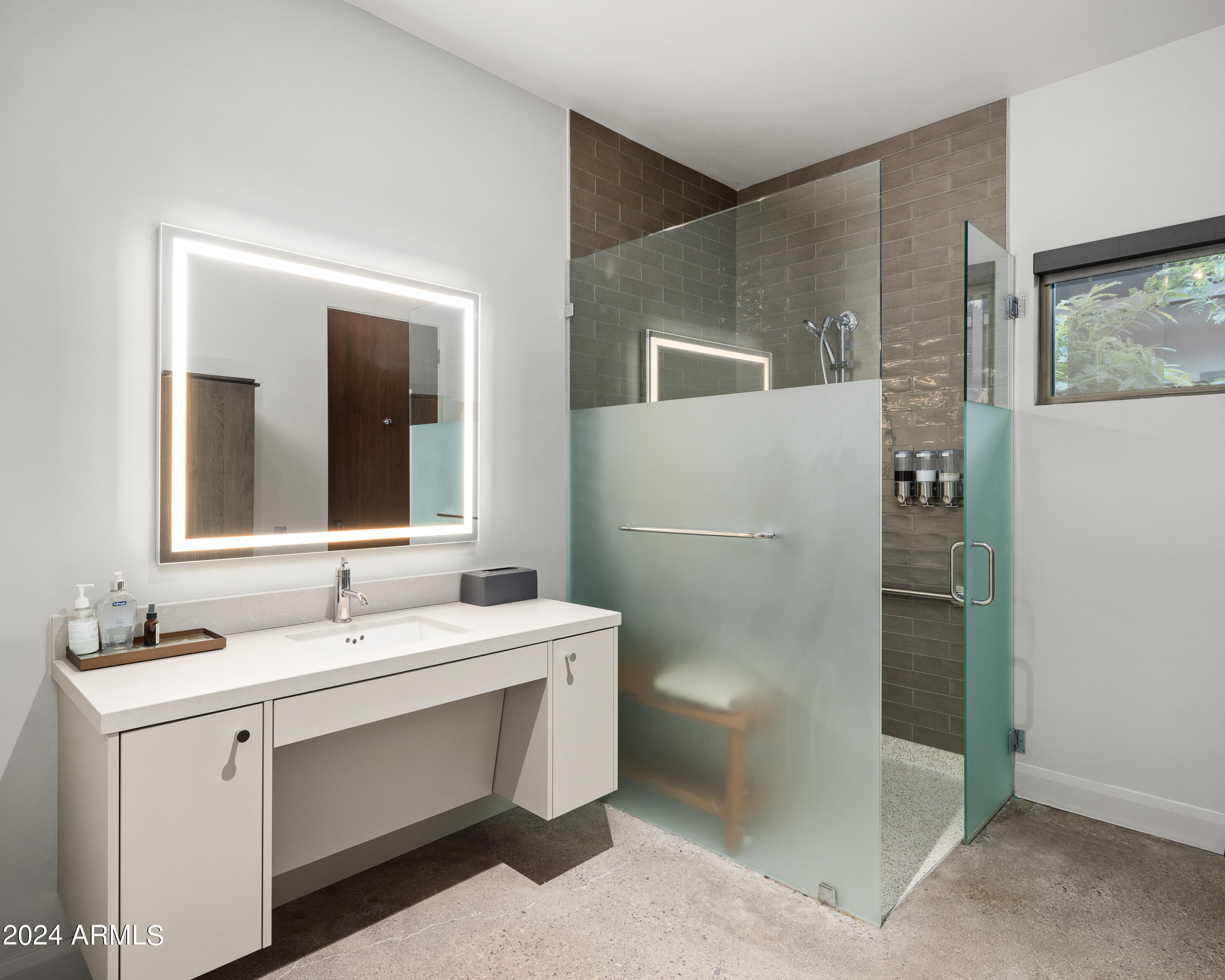 15310 North Sandy Bluff Road Fort McDowell, AZ 85264 - Photo 29 of 58 a bathroom with a double vanity sink a mirror and a toilet