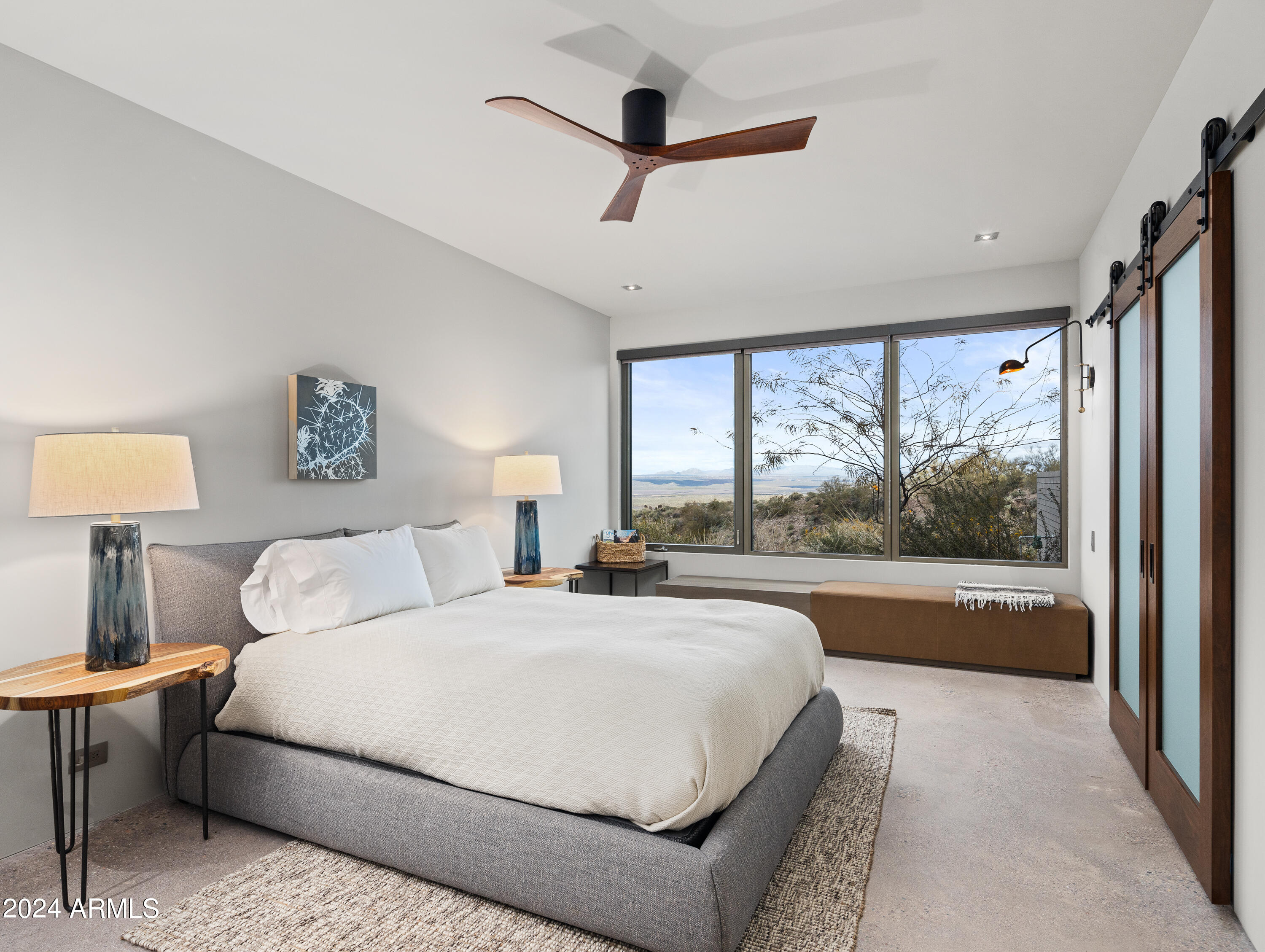 15310 North Sandy Bluff Road Fort McDowell, AZ 85264 - Photo 37 of 58 a bedroom with a large bed and a balcony view