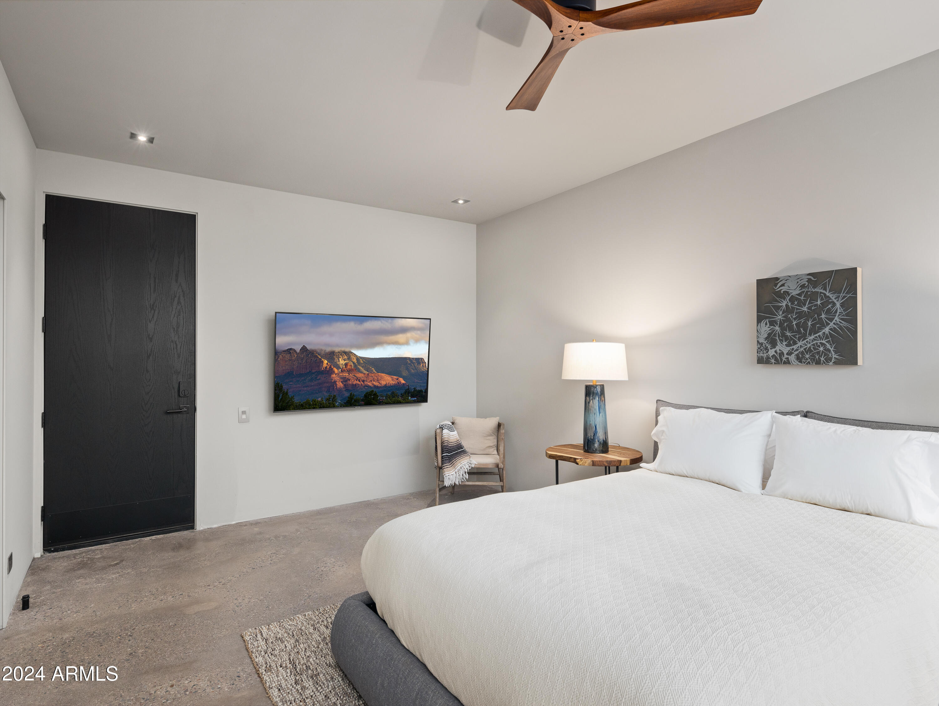 15310 North Sandy Bluff Road Fort McDowell, AZ 85264 - Photo 38 of 58 a bedroom with a bed and a painting on the wall