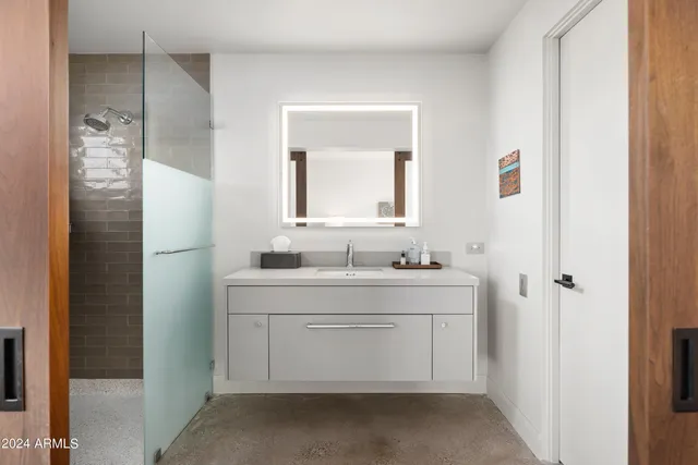 a view of a backyard with sitting area