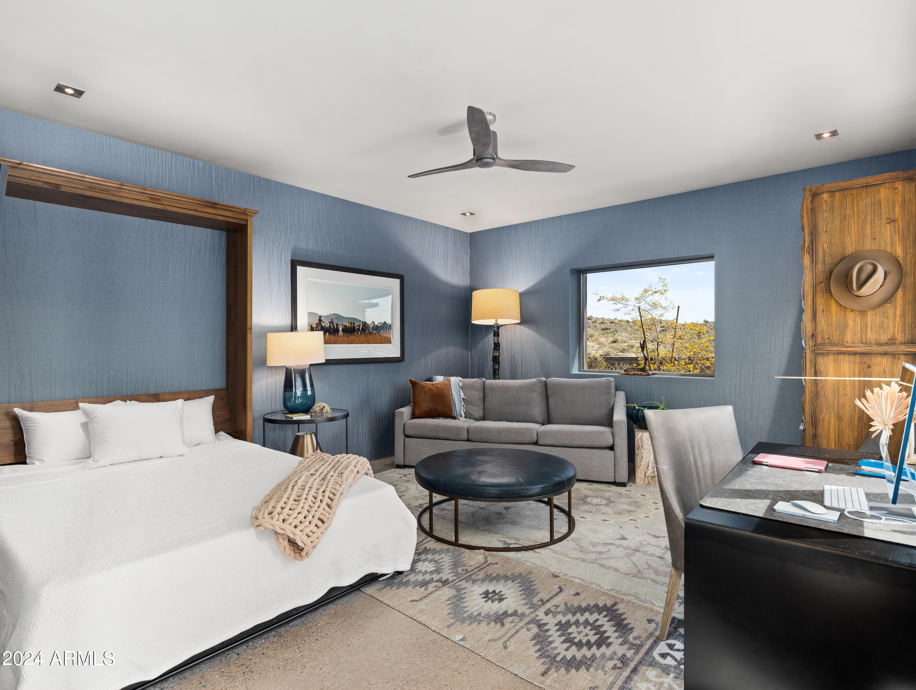 15310 North Sandy Bluff Road Fort McDowell, AZ 85264 - Photo 41 of 58 a living room with furniture ceiling fan and a window