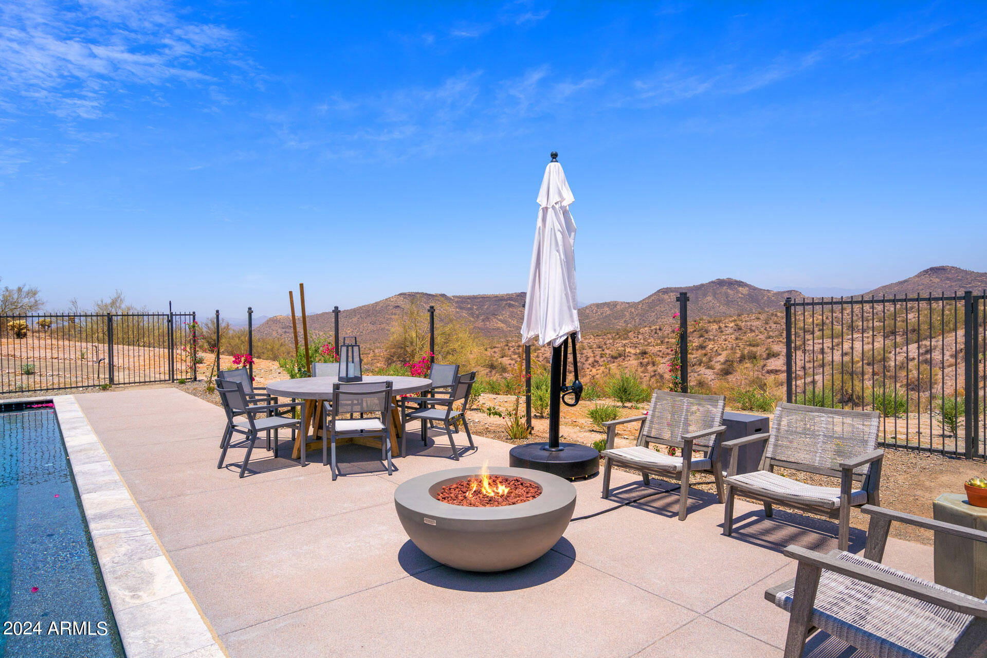 15310 North Sandy Bluff Road Fort McDowell, AZ 85264 - Photo 46 of 58 a outdoor space with patio the couches and kitchen view