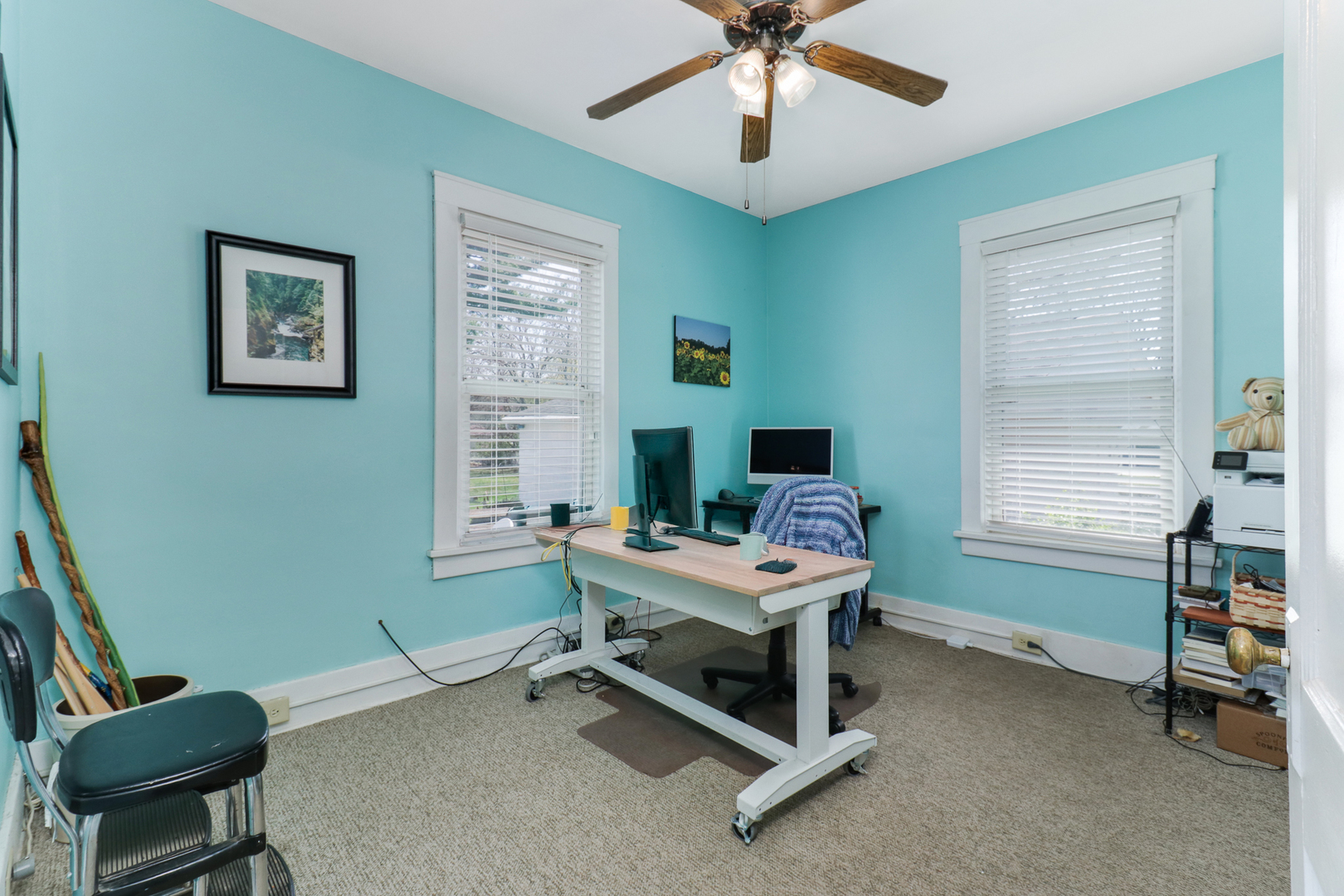 706 Vale Street Bloomington, IL 61701 - Photo 16 of 46 a view of a workspace with furniture and a window