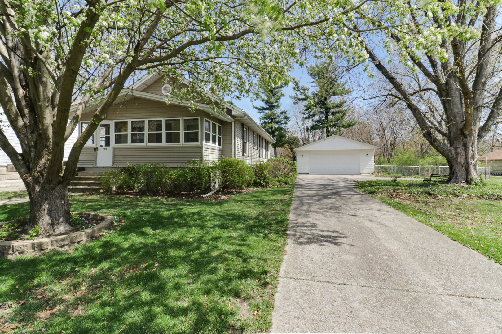 706 Vale Street Bloomington, IL 61701 - Photo 2 of 46 a front view of a house with garden
