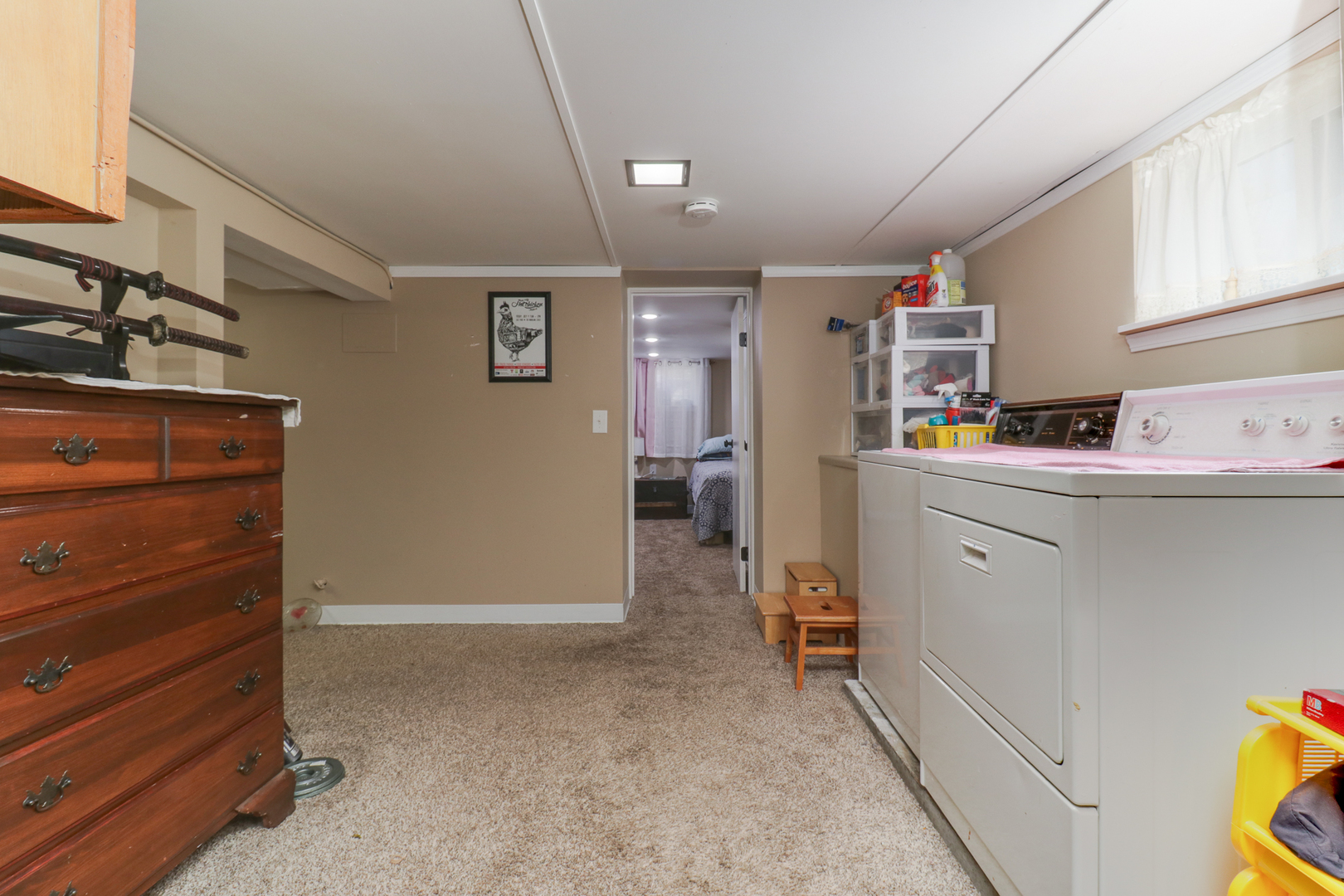 706 Vale Street Bloomington, IL 61701 - Photo 28 of 46 a room with storage and utility