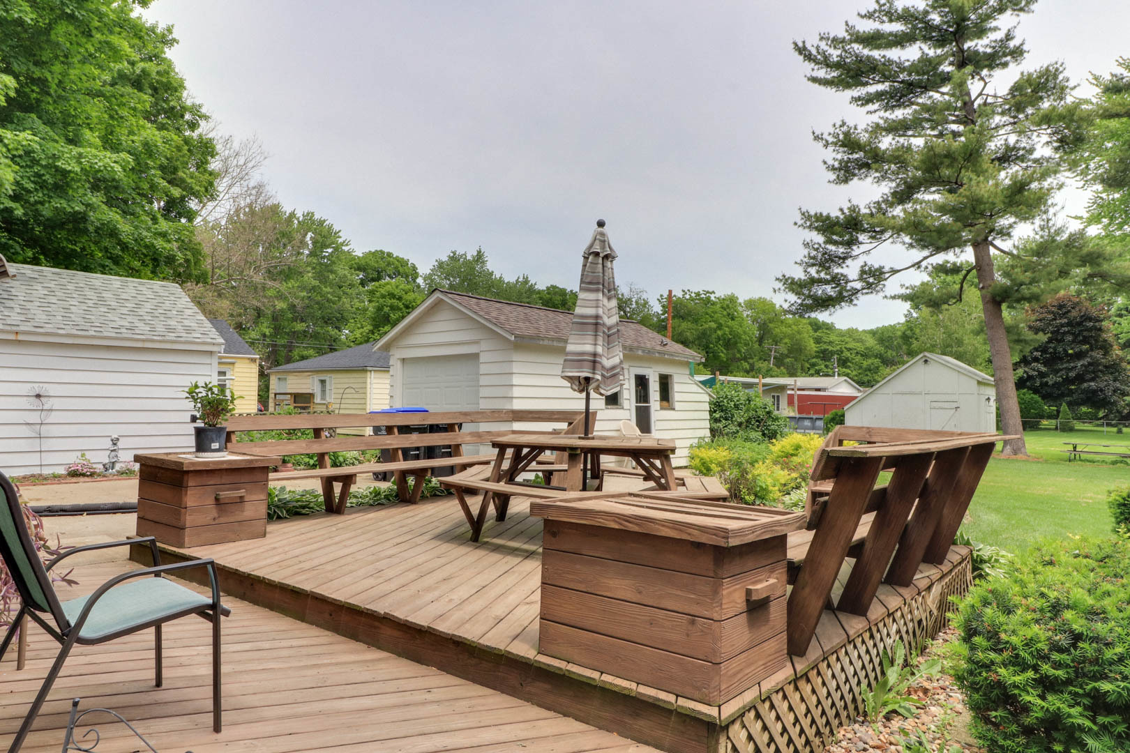 706 Vale Street Bloomington, IL 61701 - Photo 35 of 46 a view of a dinning table and chairs in patio