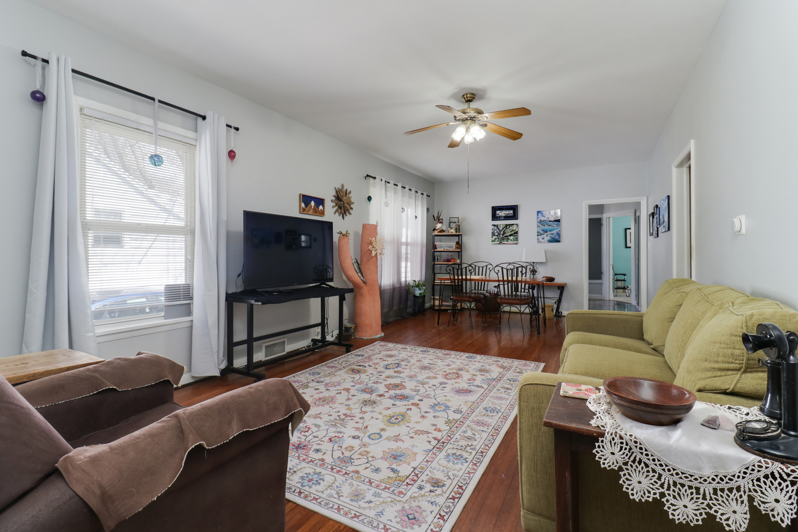 706 Vale Street Bloomington, IL 61701 - Photo 6 of 46 a living room with furniture and a flat screen tv